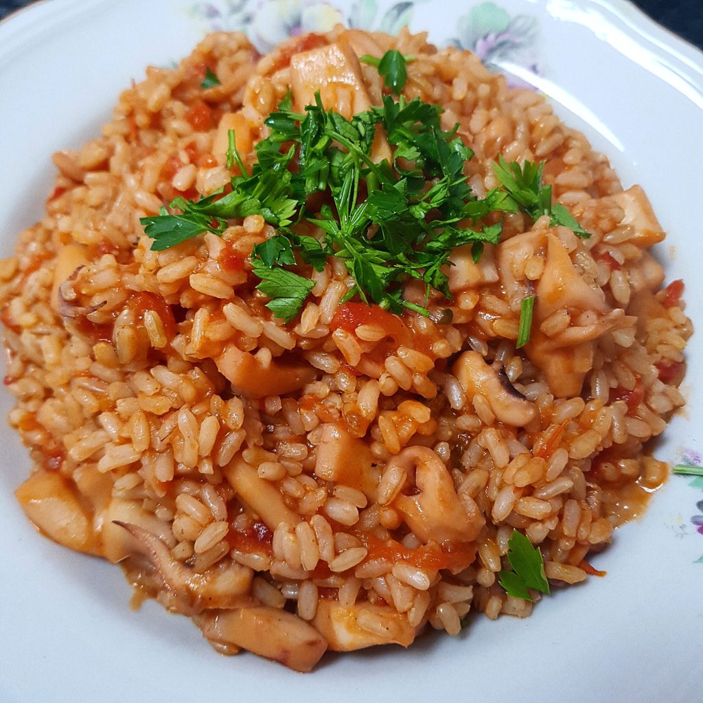 Risotto con seppie e pachino